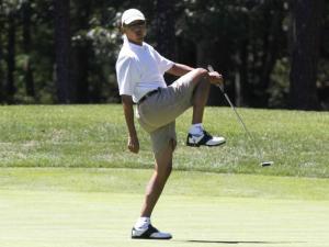 The prancing buffoon named Barack Obama.