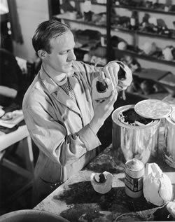 Rufus Rose working on one of his handmade puppets. 