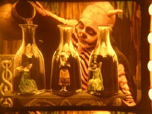 The Red Spectre with the bottled souls of his victims. 