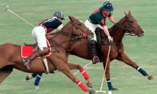 Prince Charles playing polo