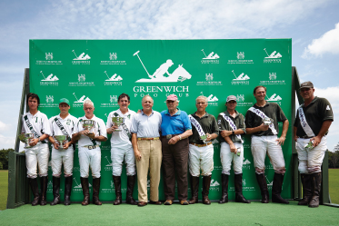 The victors and the vanquished on stage after the match.