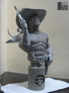 Foolkiller statue - gun raised from side