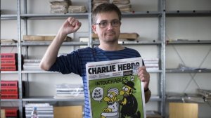 Charlie Hebdo fist in air