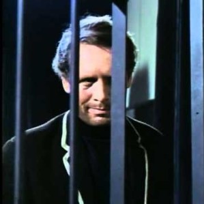 Prisoner behind bars