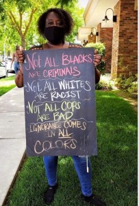 AAAAAAAAAWOMAN WITH SIGN