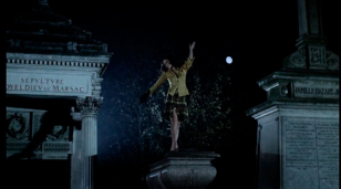 the iron rose dancing atop the